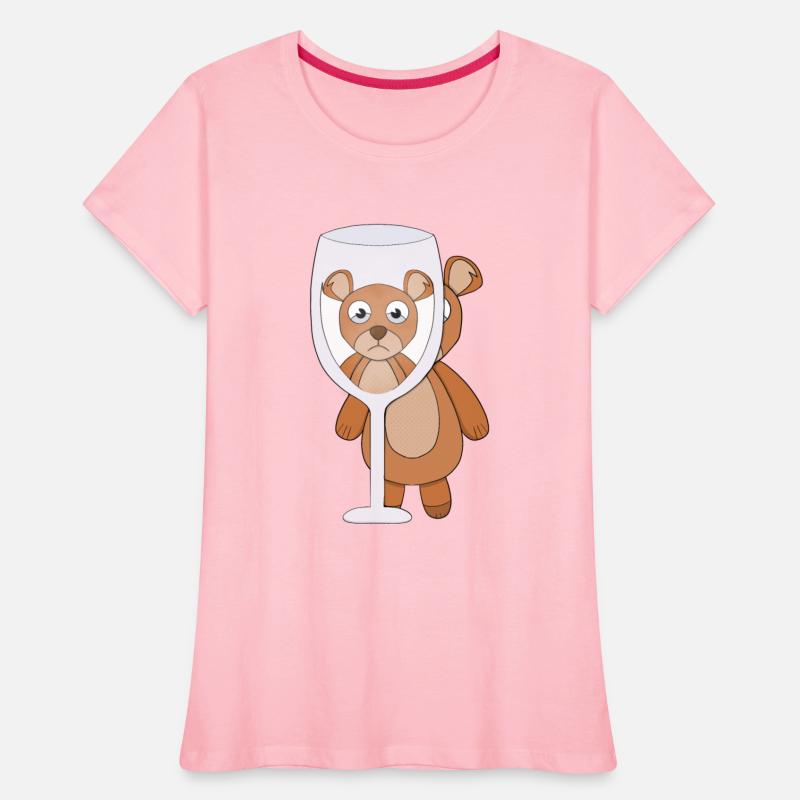 A teddy bear and empty glass