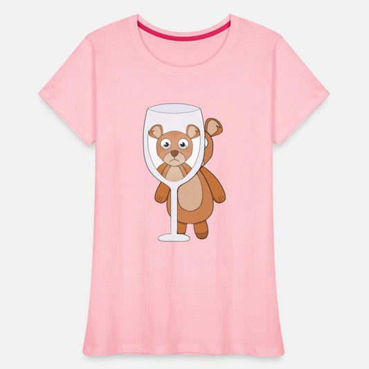 A teddy bear and empty glass